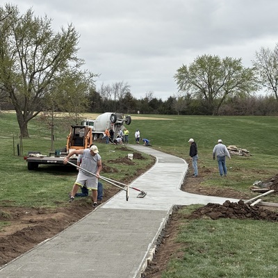 Volunteer labor keeps HCC running, maintaining the cart paths has been an ongoing project