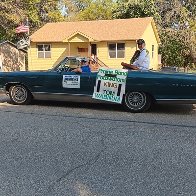 Lions serve in Mayetta by transporting parade dignitary